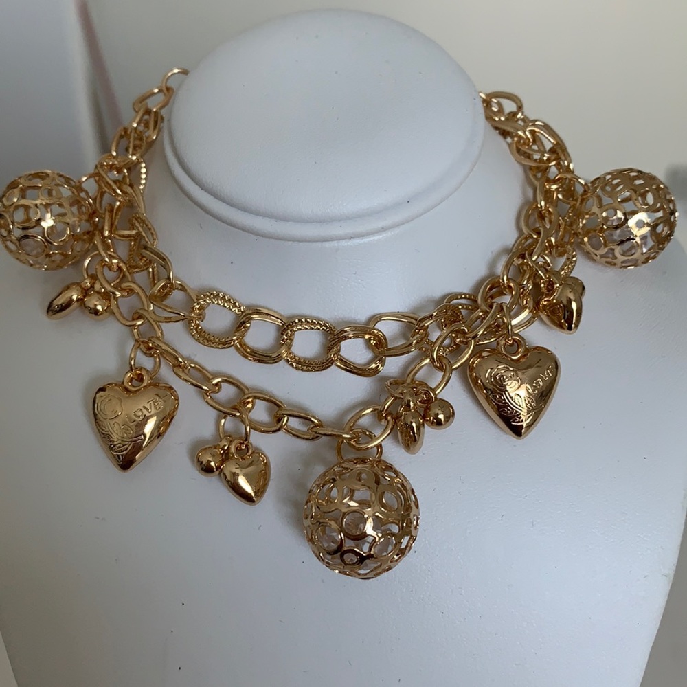 Brand New gold charm bracelet